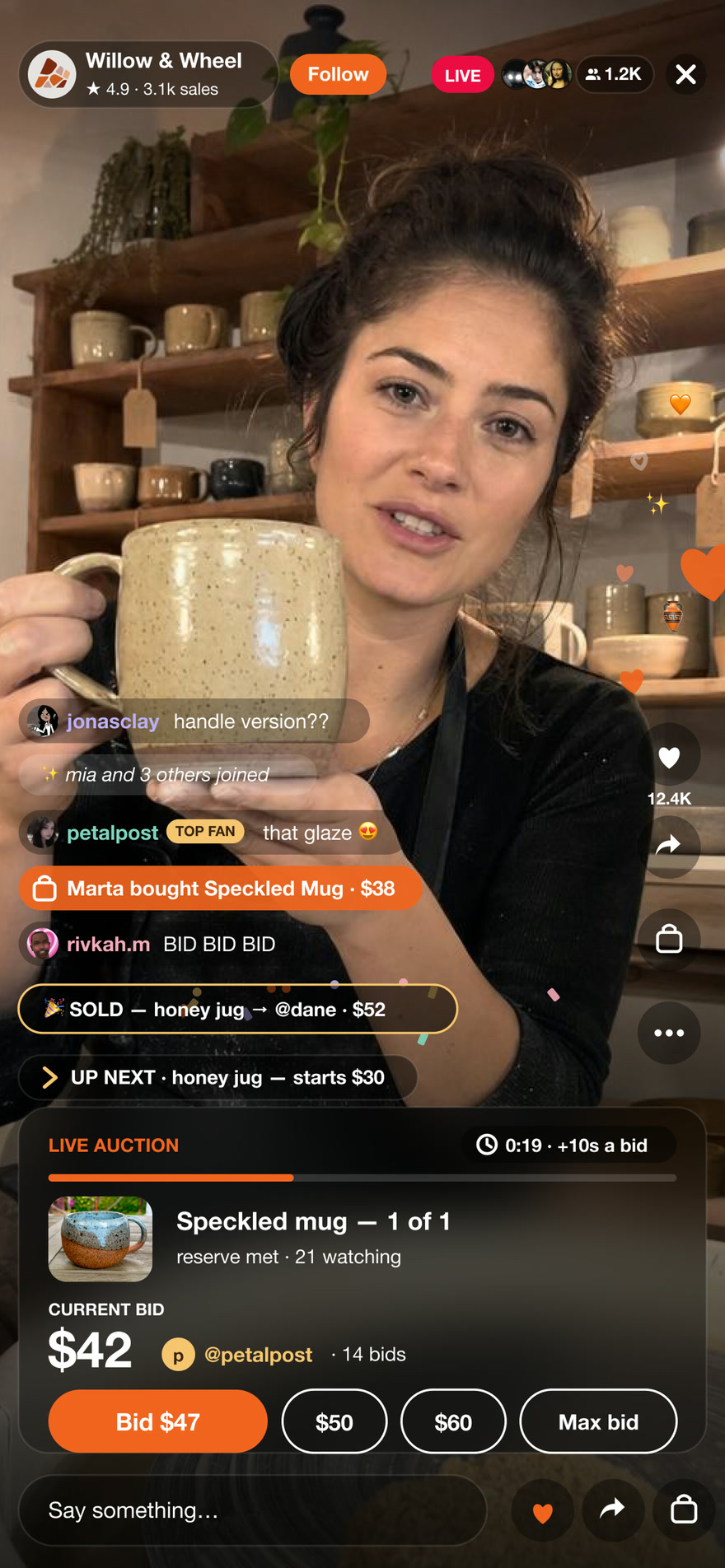 Live auction: a ceramicist sells a one of one mug with real-time bidding